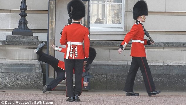 Embarrassing moment Buckingham Palace sentry slips and falls