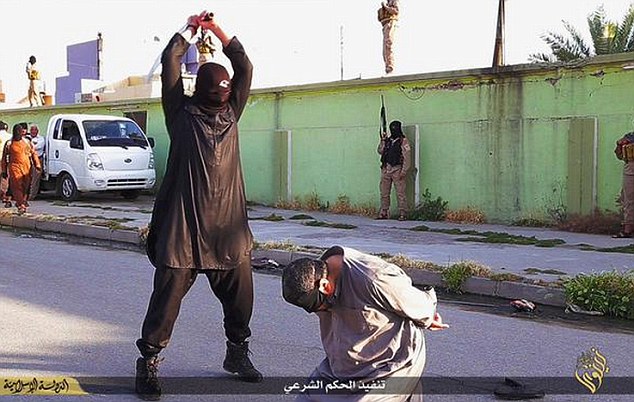 ISIS executioners behead three men accused spying for the government