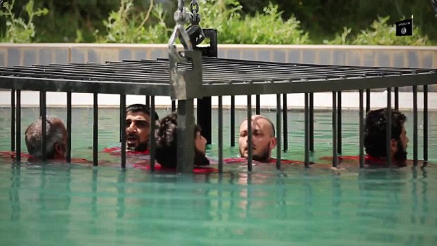 Sickening new ISIS video shows caged prisoners