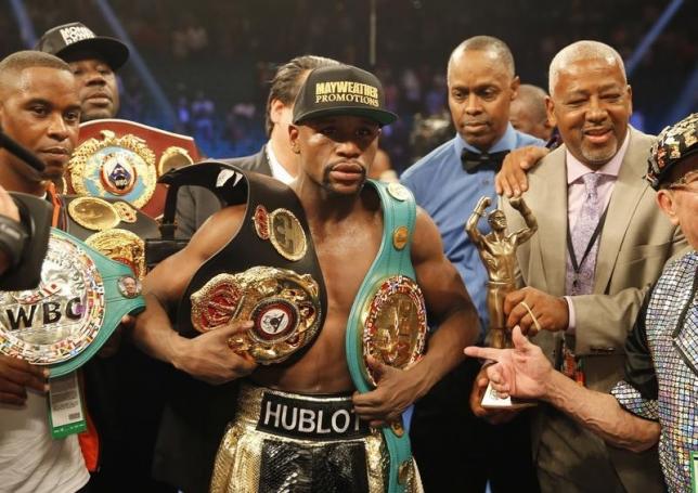 Mayweather stripped of title he won in Pacquiao fight