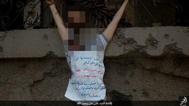 ISIS thugs behead blindfolded man and crucify his corpse ...