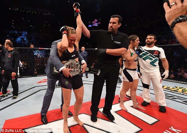 Ronda Rousey defends title with 34-second KO