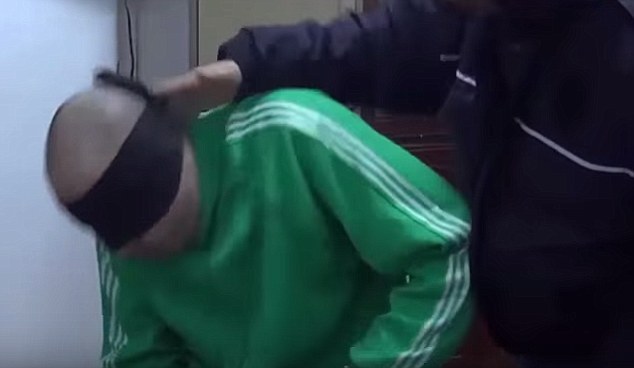 Shocking video of playboy son of former dictator Colonel Gaddafi 'being tortured in a Libyan prison'