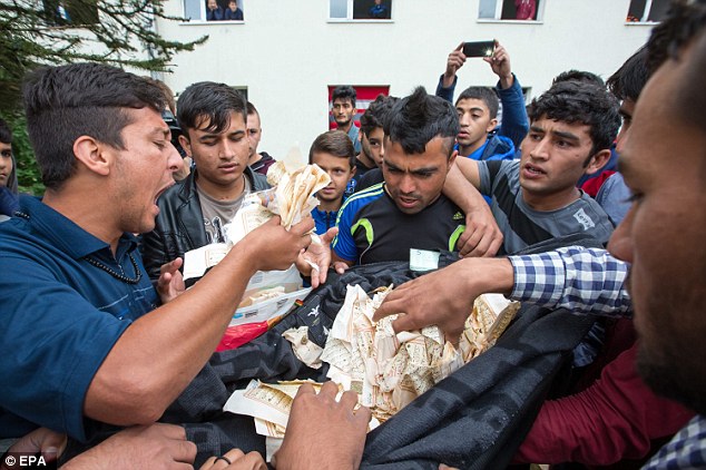 Riot breaks out at overcrowded refugee camp in Germany after resident tore pages out of the Koran