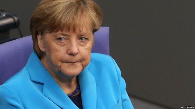 Migrant crisis: Mixed messages from Merkel