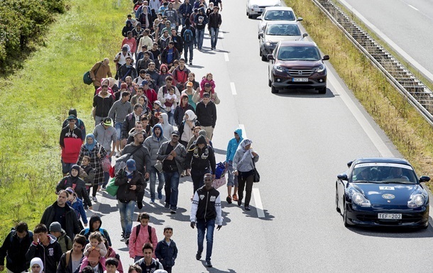 Европарламент принимает беженцев