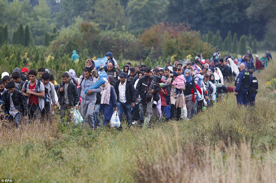 20,000 refugees arrive in Austria in just two days