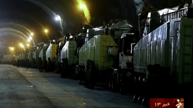 Iran reveals underground tunnel filled with missile launchers