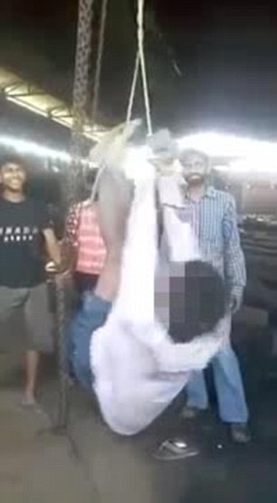 Migrant worker being strung up by his hands and feet and beaten for 34 MINUTES