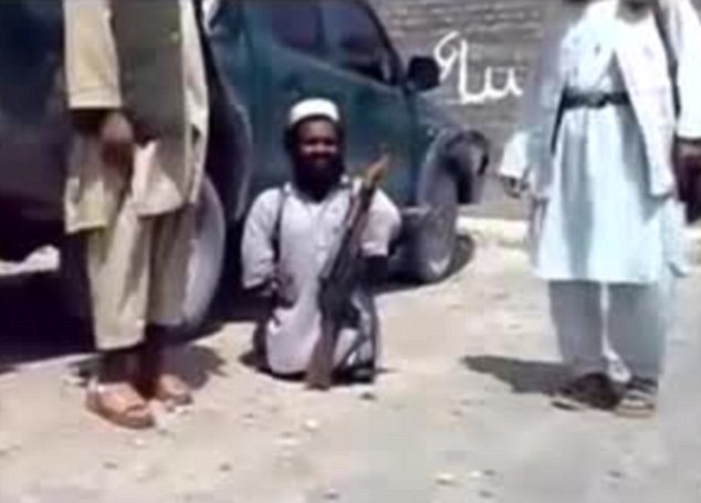 The three-foot tall jihadi who is hardly bigger than his Kalashnikov and is nicknamed 'Al-Chihuahua'