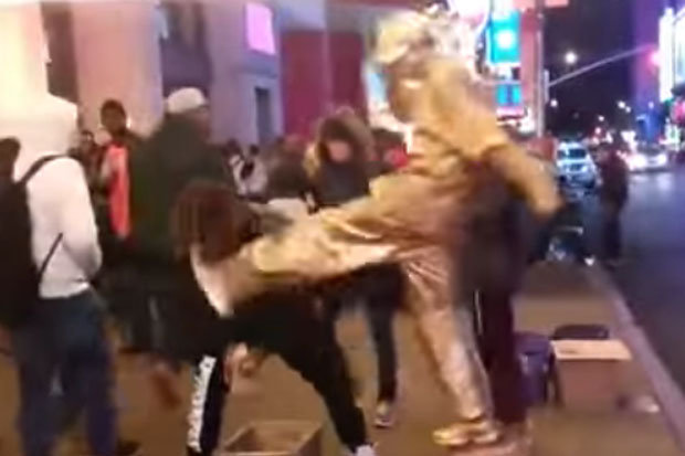 Human statue flies into action after getting robbed