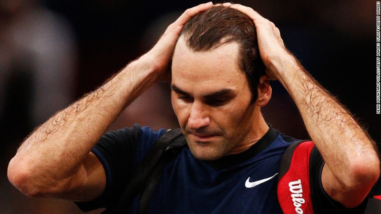 Roger Federer knocked out in Paris by John Isner's power