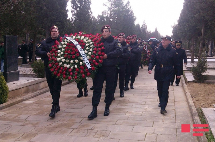 Azerbaijan buries policemen killed in clash with Islamists