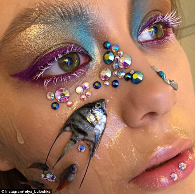 Russian makeup artist sparks outrage after using DEAD fish on models' faces