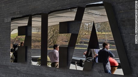 U.S. charges 16 FIFA officials in widening probe