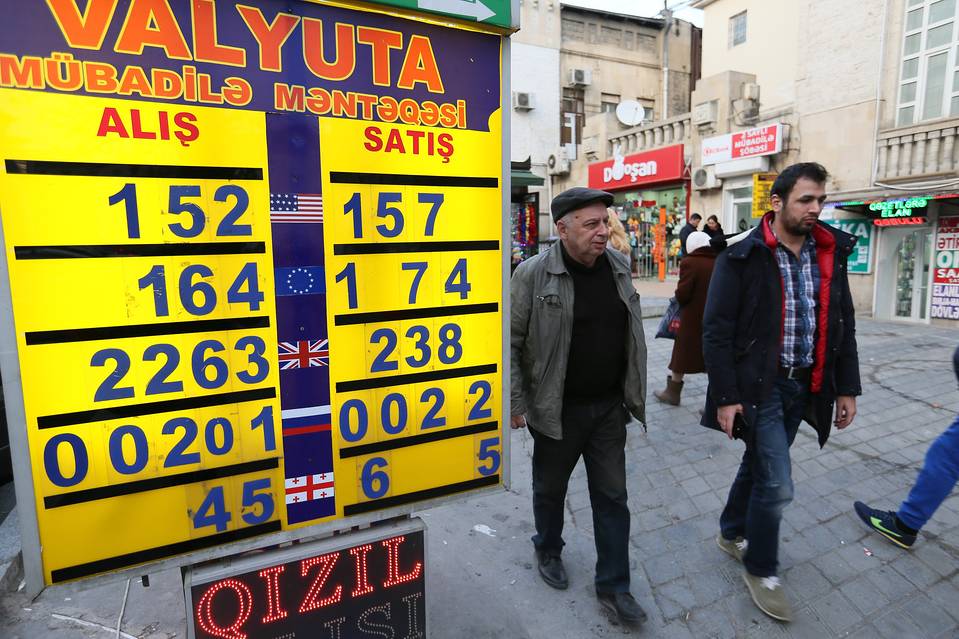 Azerbaijan limits currency exchange amid currency slide