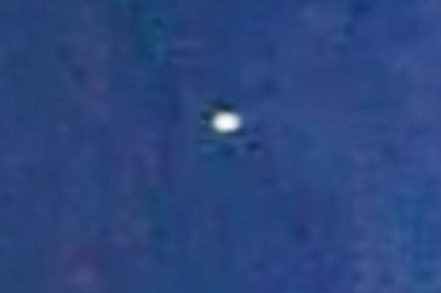 Mysterious UFO floating through sky leaves alien investigators puzzled