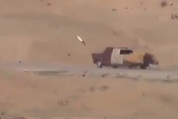 Explosive moment rocket slams into ISIS suicide car speeding towards Syrian town