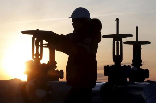 Brent edges higher, but U.S. oil down on stock build