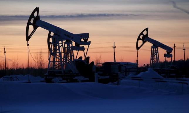 Oil jumps as sentiment gets boost, but analysts warn of ongoing glut