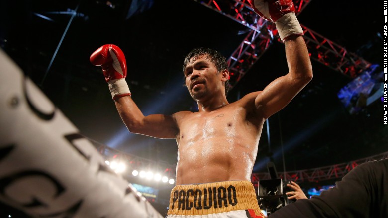 Manny Pacquiao beats Bradley, hints at retiring