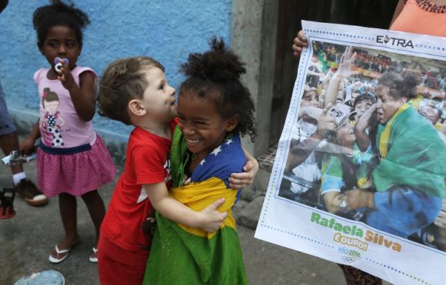 Brazil judo champ stirs hope in slum where she grew up