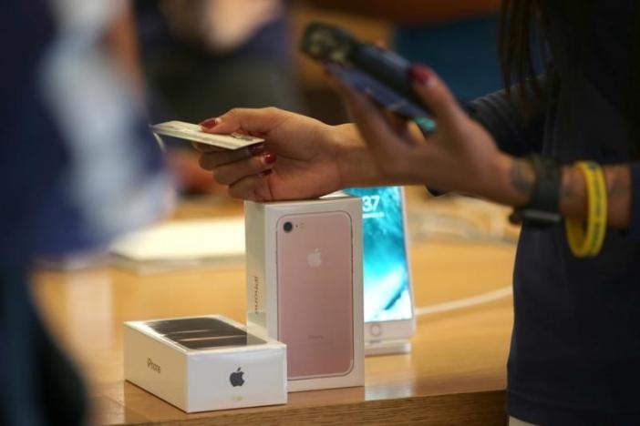 Apple's holiday surprise: big sales, not so big profits