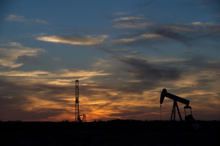 Oil prices fall as production creeps up