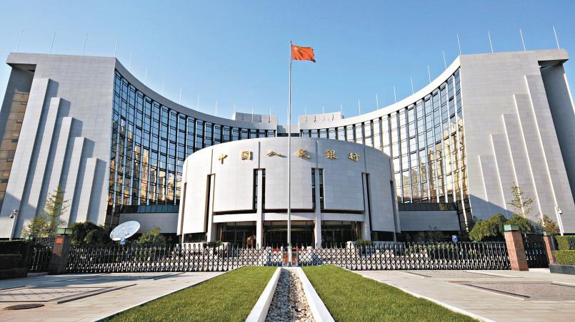 China's central bank says in no rush to follow global easing trend
