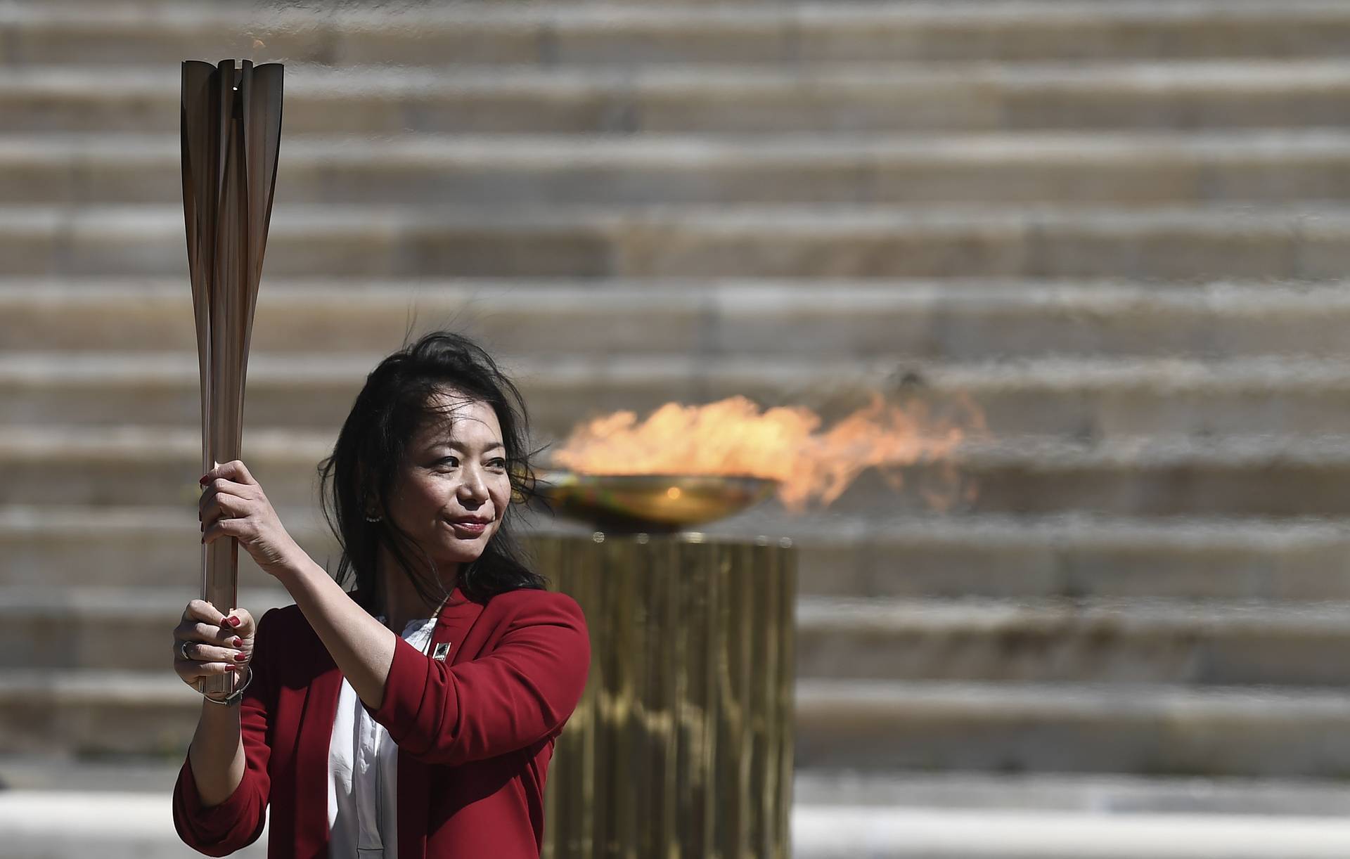 Олимпийский огонь доставлен в Японию
