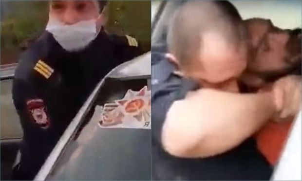 Rusiyada polis xidməti maşında şübhəlini boğmağa cəhd etdi - VİDEO