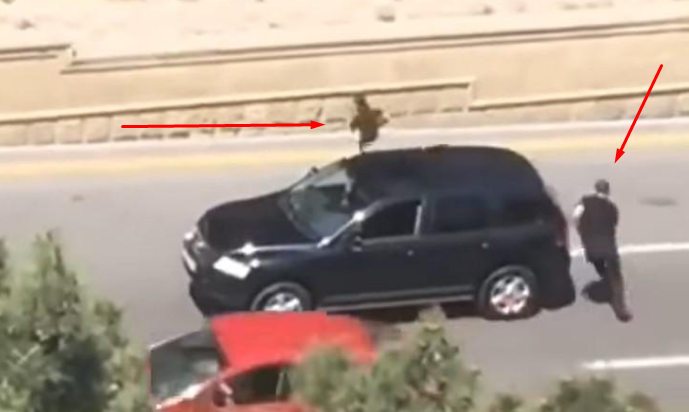 Bakıdakı qalmaqallı video: avtomobildən düşüb qaçan qadınla bağlı AÇIQLAMA