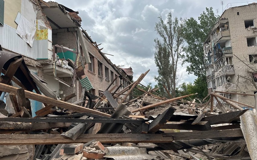 Russian shells residential area in Ukraine, killing 4, injuring 11