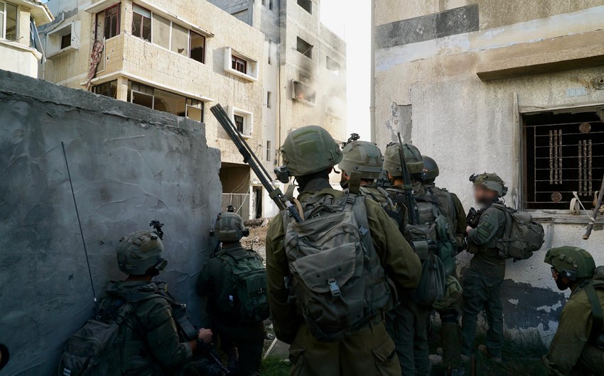 Israel raids Gaza's Al Shifa Hospital, urges Hamas to surrender