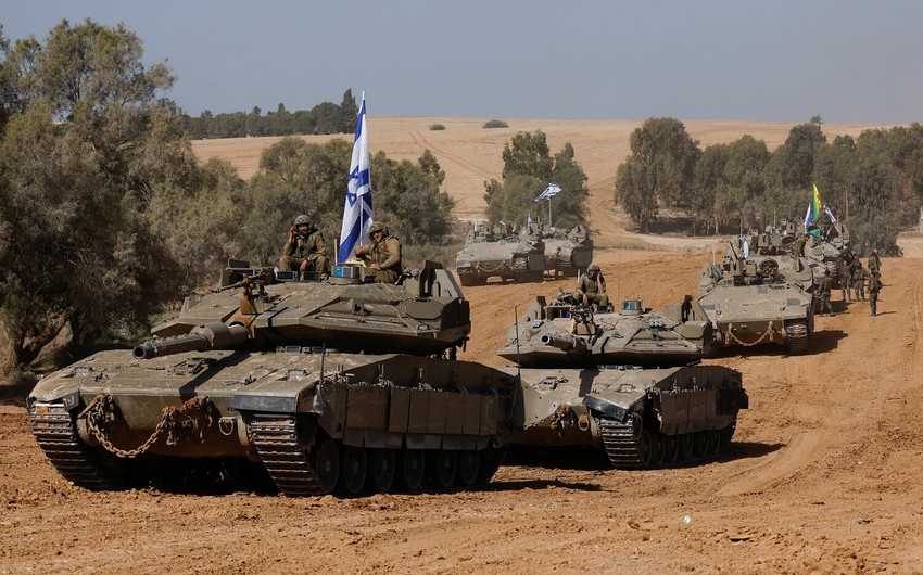 Israeli military strikes back after rocket fire from Syria