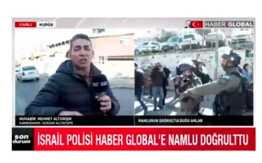 Israeli police point gun at employees of Haber Global in Al-Quds