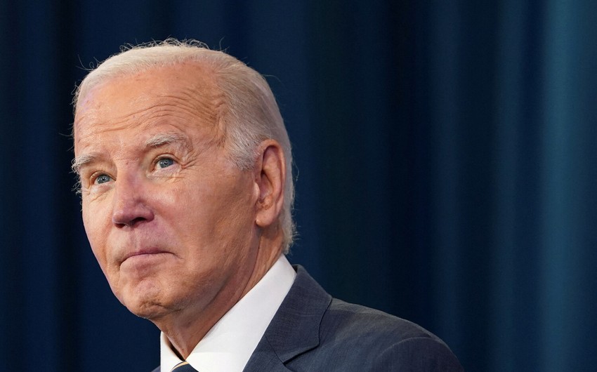 Biden calls Trump 'front runner' of opposition