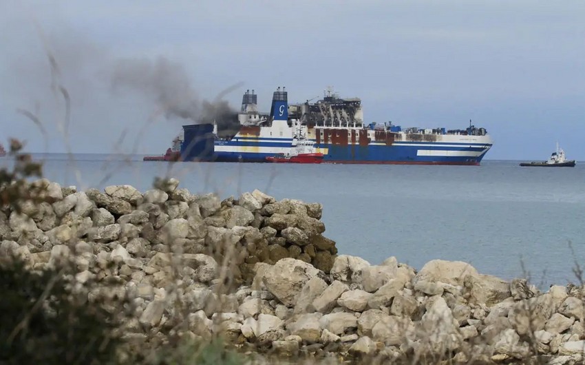 British Navy says attacked ship ablaze off the coast of Yemen
