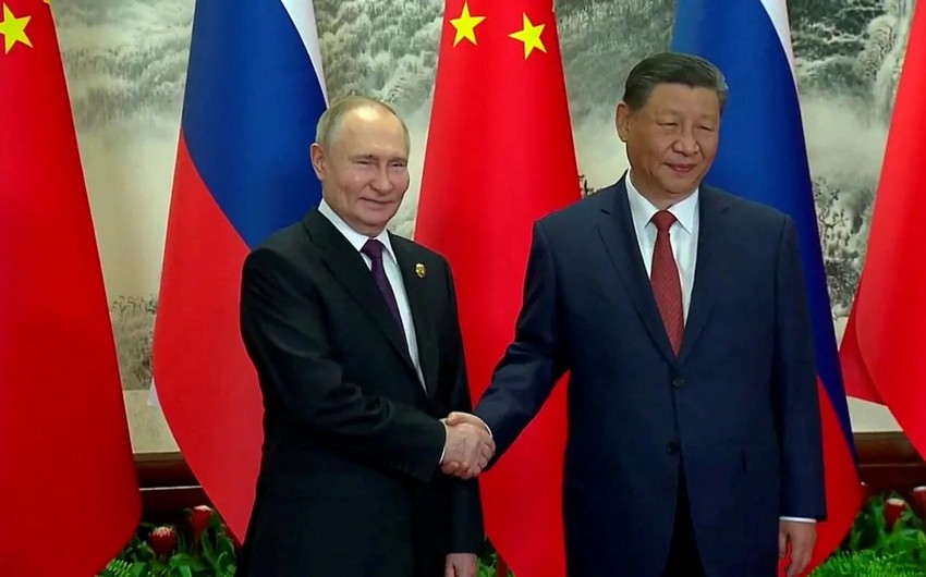 Russian, Chinese leaders meet in Beijing