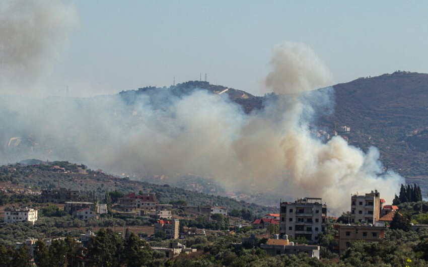 Lebanon says Israeli airstrikes kill at least 100 people