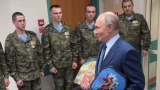 Putin visits military hospital with icons gifted by soldiers