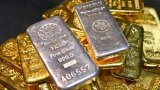 Золото и серебро вновь подешевели