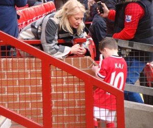 Kai Rooney, five, is asked for his AUTOGRAPH