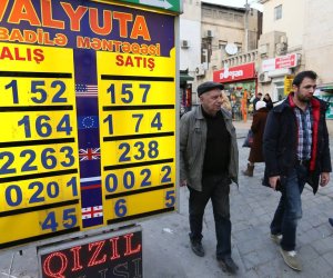 Azerbaijan limits currency exchange amid currency slide