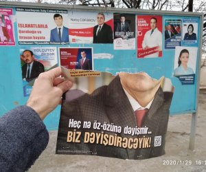 Namizədlərin plakatları qəsdən cırılır -  İDDİA  FOTO