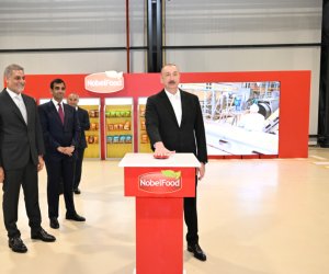 Azerbaijan's President Aliyev opens new snack food plant in Baku