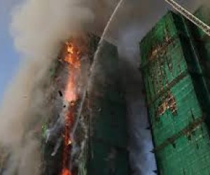 
Honq Konqda yaşayış kompleksində yanğında ölənlərin sayı 65-ə çatıb -YENİLƏNİB3