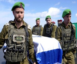 HAMAS israilli girovun meyitini BQXK-ə təhvil verir