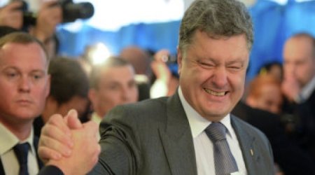 In Ukrainian election, chocolate tycoon Poroshenko claims victory