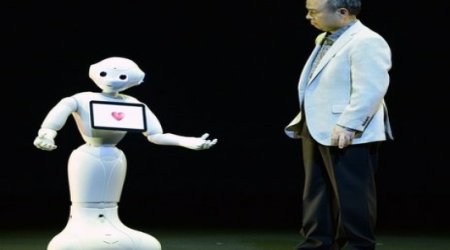 Softbank unveils 'human-like' robot Pepper
